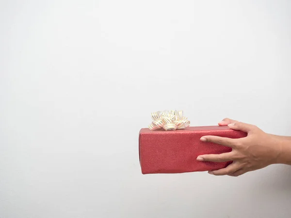 Woman Hand Giving Red Gift Box White Background Copy Space — 스톡 사진