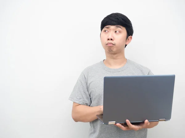 Asian Man Using Laptop Feeling Bored Looking Copy Space — Zdjęcie stockowe