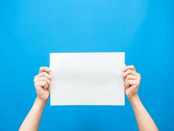Man Hand Show White Paper Empty Blue Background — Stockfoto