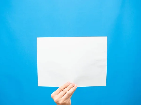 Hand Show White Paper Empty Blue Background — Stockfoto