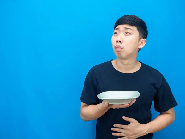 Man Feeling Hungry Holding Dish Looking Copy Space Thiking Dinner — Fotografia de Stock