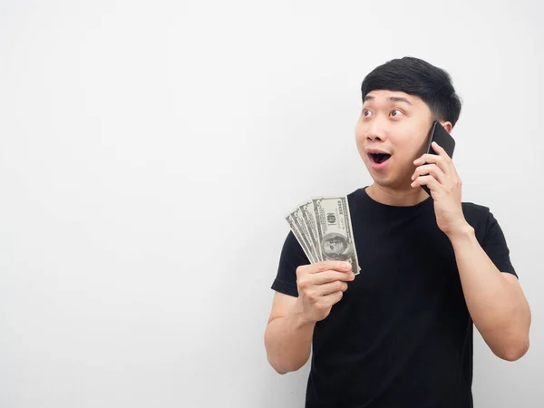 Asian Man Talking Mobile Phone Holding Money His Hand Feeling — Stock Photo, Image