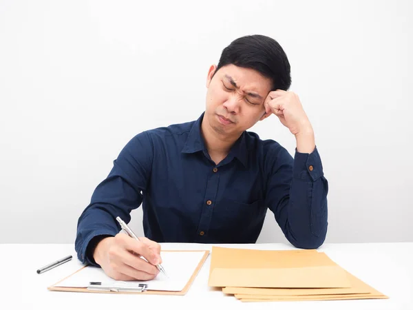Asian Man Writing Document Board Feeling Strain White Background — Stockfoto