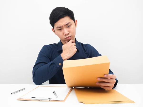 Man Sitting His Workplace Thinking Document Envolope His Hand Table — ストック写真