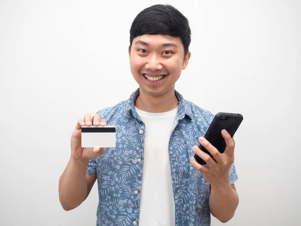 Portrait Man Holding Mobile Phone Showing Credit Card — Stockfoto