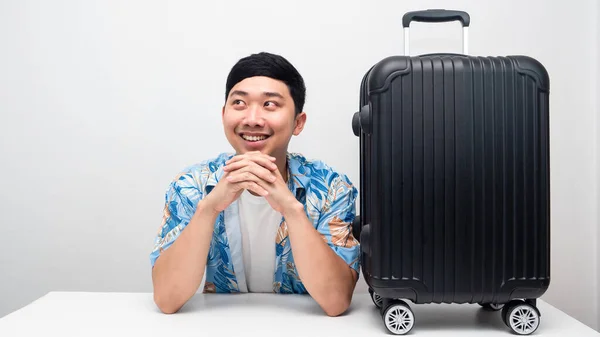 Man Blue Shirt Luggage Smiling Thinking Holiday Trip — Stockfoto
