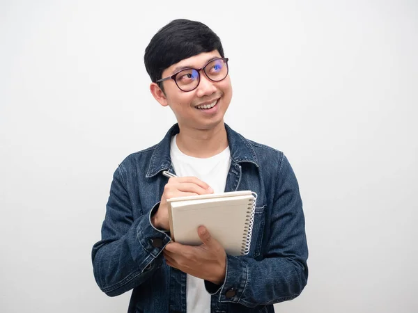 Positive Man Jeans Shirt Wearing Glasses Writing Diary Looking — ストック写真
