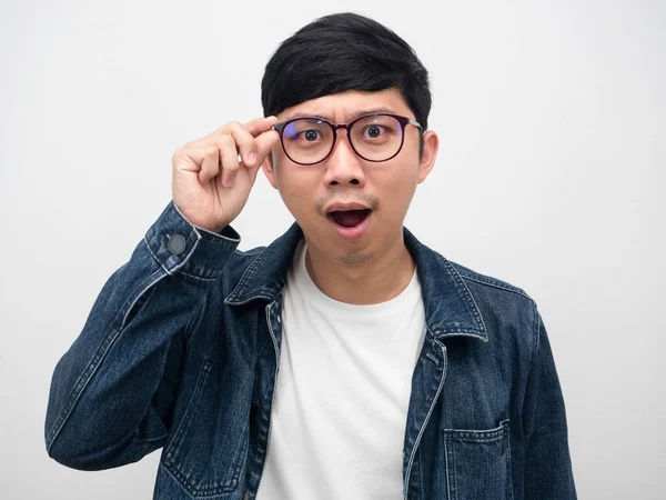 Asian Man Jeans Shirt Touch Glasses Amazed Emotion Studio Shot — Stockfoto