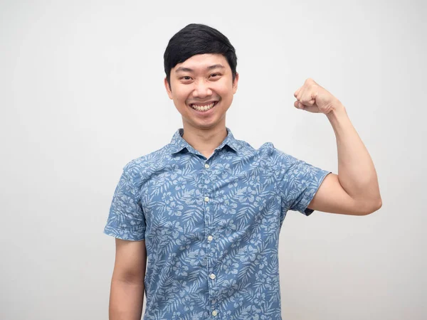 Young Man Blue Shirt Showing Muscle Happy Smile Good Healthly —  Fotos de Stock