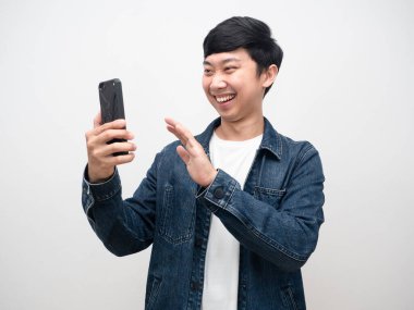 Positive man jeans shirt video call with smartphone isolated