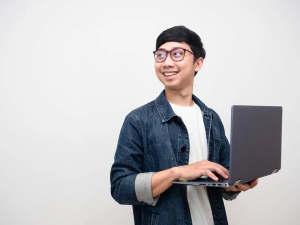 Young Businessman Jeans Shirt Gentle Smile Using Laptop Turn Face — Stock fotografie