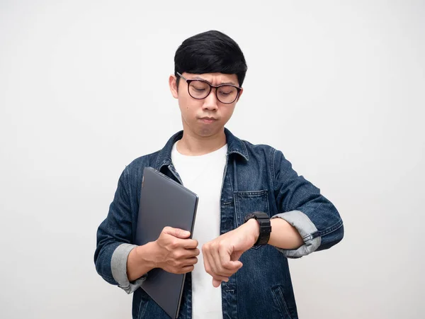 Man Jeans Shirt Laptop Serious Looking His Watch — Stockfoto