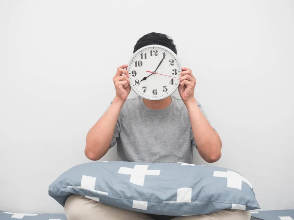 Man Sit Bed Holding Analog Clock Close His Face Wake — Fotografia de Stock