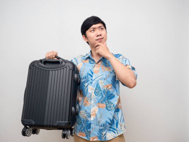 Asyalı adam elinde Lawrence jesti ile tatilini yalnız başına düşünüyor.