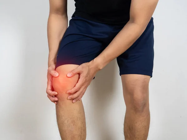 Man Hurt His Knee Hold Hand White Background — Stok fotoğraf