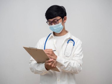 Portrait doctor writing on check list wood board isolated