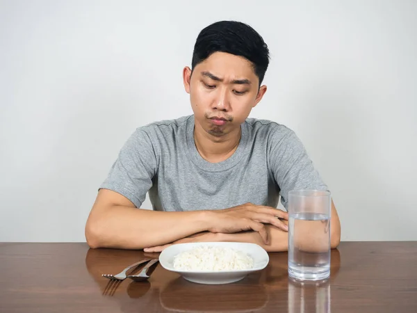 Young Man Feels Bored Food Looking Rice Water Table — Fotografia de Stock