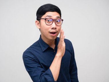 Young businessman gesture whisper isolated