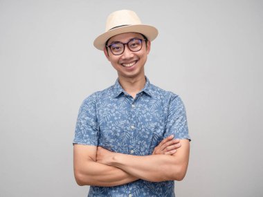 Travler man wear hat happiness smile crossing arms isolated