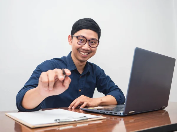 Businessman smile and point at you for choosing you about working