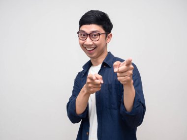 Positive young man cheerful double point finger at you