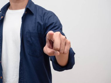 Close up man point finger at you studio shot copy space