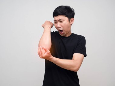 Man black shirt feels pain his elbow isolated