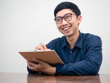 Young businessman hold document board for interview