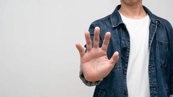 Close up man show hand stop studio shot isolated