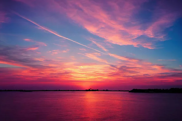 Beautiful pastel pink and purple skies and clouds at night as the sun sets. Beautiful sky and clouds