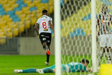 Atletico-MG 'den Jair, Brezilya' nın Rio de Janeiro şehrindeki Maracana Stadyumu 'nda oynanan Brasileirao Serie A 2022 maçında Fluminense ve Atletico-MG arasındaki maçta attığınız puanı kutluyor. Bu oyun 38 raundun üçünde geçerlidir.