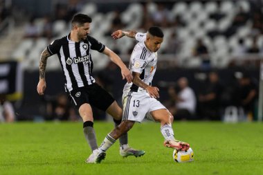 Atletico-MG takımından GUILHERME ARANA 17 Temmuz 2022 tarihinde Brezilya 'nın Rio de Janeiro şehrinde Brasileirao Serie A 2022' nin bir parçası olarak Botafogo ve Atletico-MG arasında oynanan karşılaşmada.