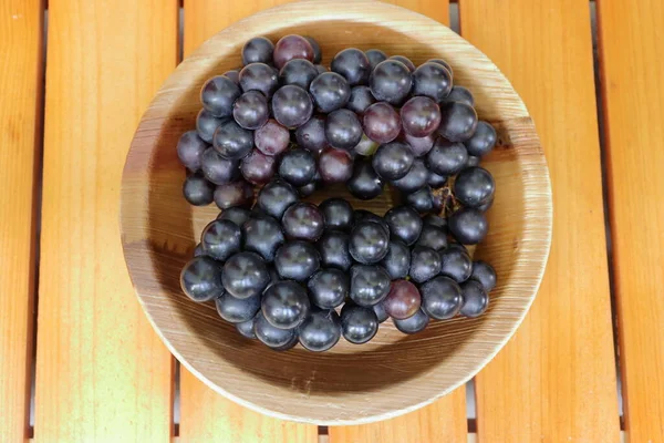 Ripe Purple Grapes Close Wooden Background Bad Cholesterol Prevention Healthy — Stok fotoğraf