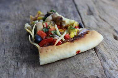 Delicious pizza slices with tasty cheese falling from 