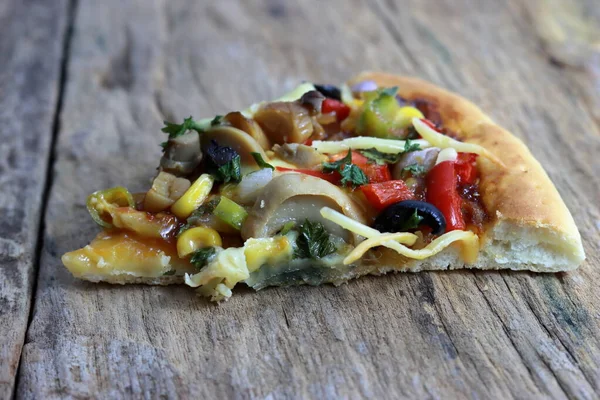 Delicious pizza slices with tasty cheese falling from 