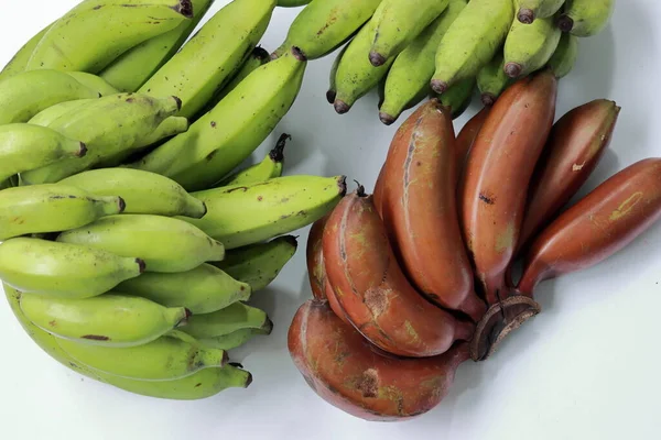 Banana on white background. Healthful banana collection. Ripe bunch of bananas
