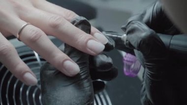 The process of manicure in a beauty salon close-up