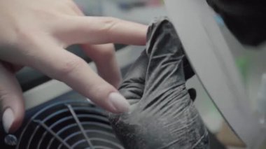 The process of manicure in a beauty salon close-up