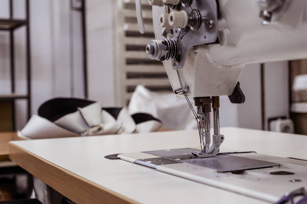 Sewing machine needles close-up in the workshop