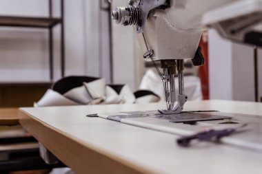 Sewing machine needles close-up in the workshop