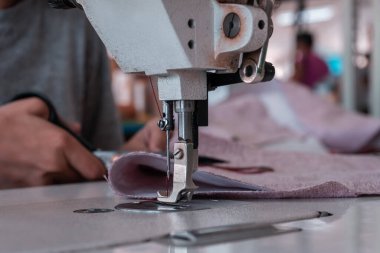 Sewing machine needles close-up in the workshop