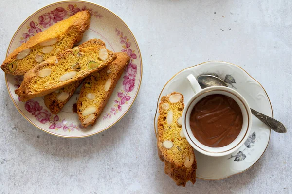 Italian cantuccini biscuits and dark chocolate pot