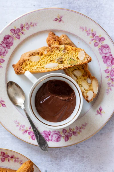 Italian cantuccini biscuits and dark chocolate pot