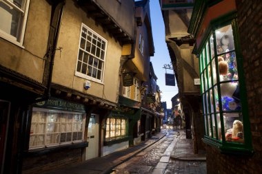 YORK, UNITED KINGDOM - 16th DECEMBER, 2018: The Shambles is one of the best-preserved medieval shopping streets in Europe.City of York gets decorated with Christmas lights.