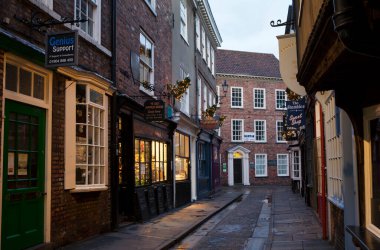 YORK, UNITED KINGDOM - 16th DECEMBER, 2018: The Shambles is one of the best-preserved medieval shopping streets in Europe.City of York gets decorated with Christmas lights.