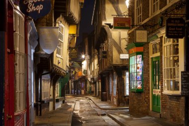 YORK, UNITED KINGDOM - 18th DECEMBER, 2018: The Shambles is one of the best-preserved medieval shopping streets in Europe.City of York gets decorated with Christmas lights.