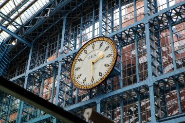 LONDON, UNITED KINGDOM - DECEMBER 4th, 2017: Interior of Kings Cross St Pancras international railway station is a mixture of old historic building and modern glass design.