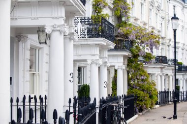 LONDON, UK - MAY 10th, 2018: Beautifull houses in Notting Hill.The area is known for being a cosmopolitan neighbourhood, hosting the annual Notting Hill Carnival and Portobello Road Market