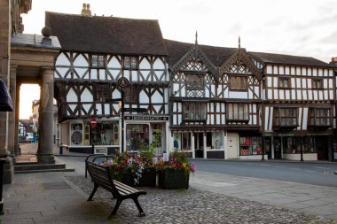 LUDLOW, SHROPSHIRE, ENGLAND, UK - 7th September 2019: Historic buildings along the street of the market town of Ludlow