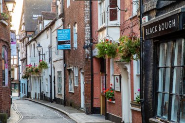 LUDLOW, SHROPSHIRE, ENGLAND, UK - 8th September 2019: Historic buildings along the street of the market town of Ludlow
